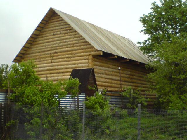 рубленый дом из бревна 6х7, рубленные фронтоны